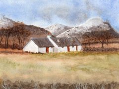 Blac Rock Cottage and snowy mountain top.